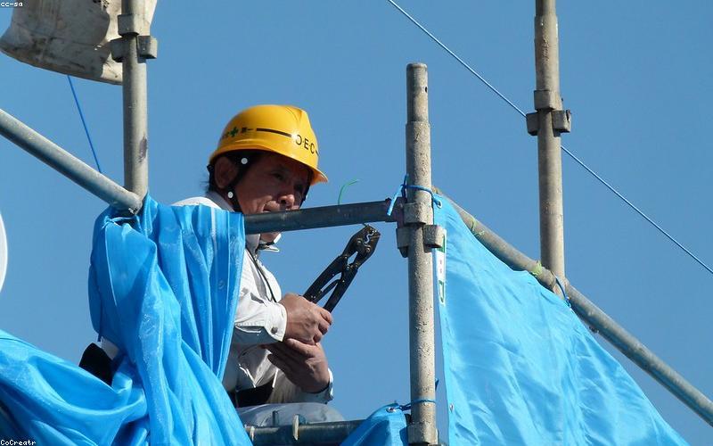 Solar installer working on roof